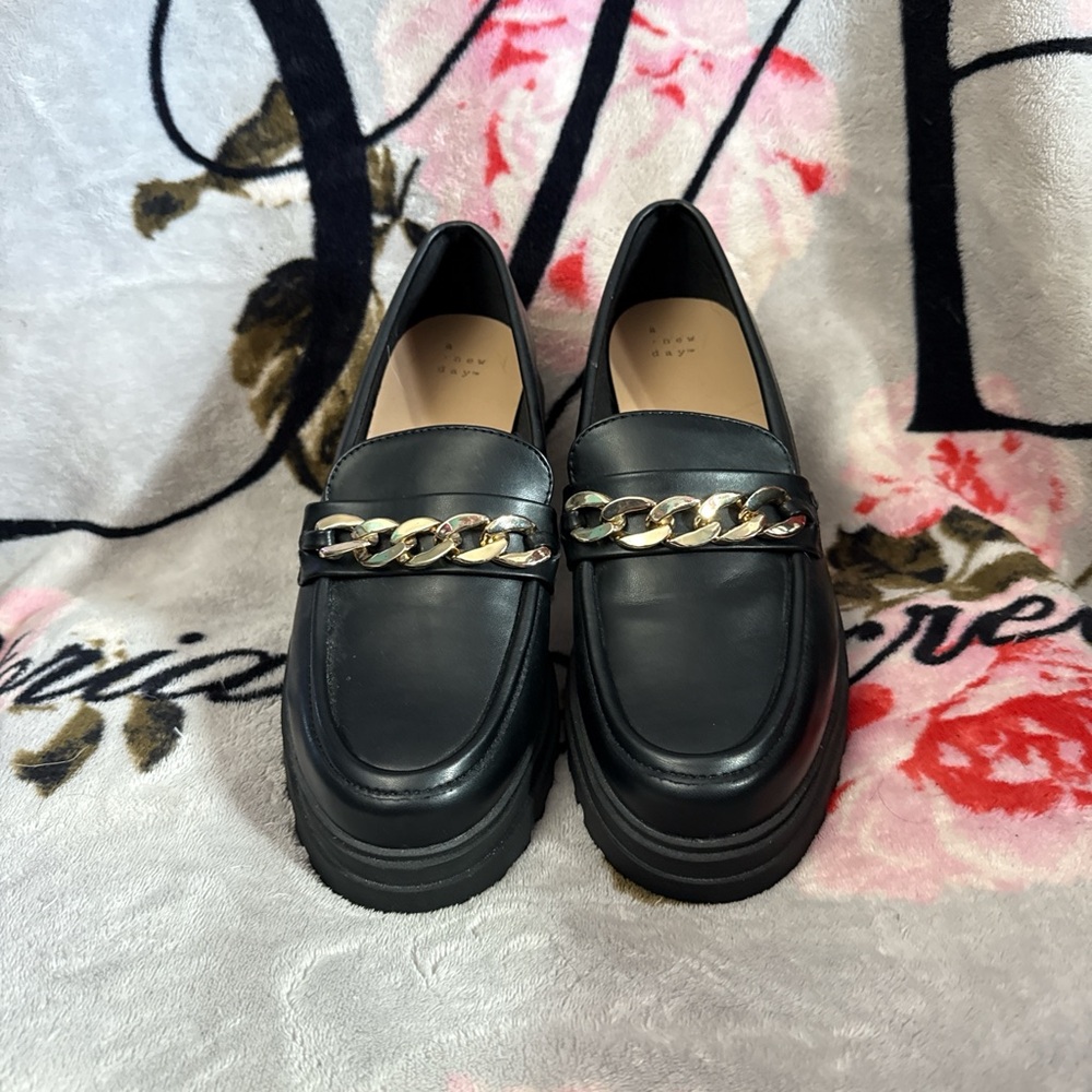 Black and Gold Platform with Modern Chain Detail